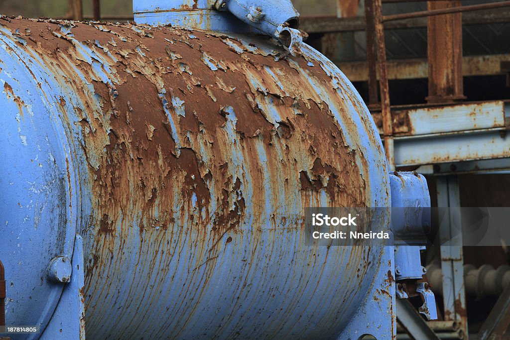 Oil pump motor Close up from an old oil pump Blue Stock Photo