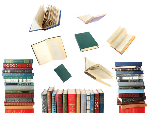 istock Books flying over stacks on white background 1878156634
