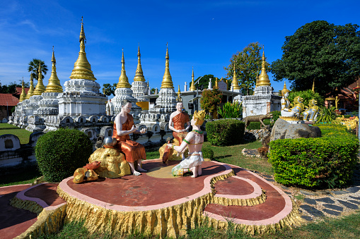 Lampang, Thailand - December 2, 2023: Wat Phra Chedi Sao Lang is a Buddhist temple in Lampang, Thailand and is noted for its series of 20 chedi arranged in a courtyard.