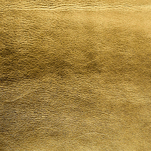 goldene farbe aus leder - cracklier stock-fotos und bilder