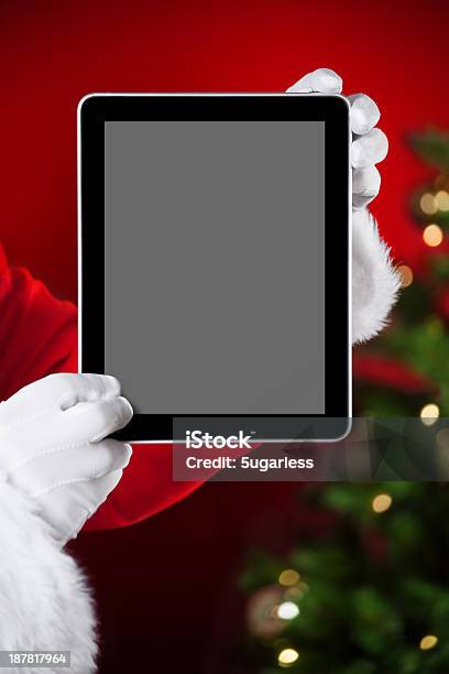 Santa Holding A Tablet With Blank Space Stock Photo - Download Image Now - Computer Monitor, Christmas, E-commerce