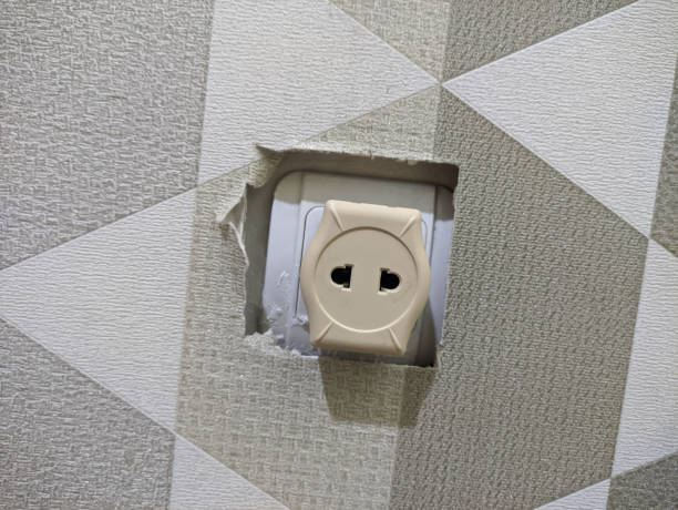 type c wall plugs that stick out from inside the wall and are commonly used in europe and most asian countries - drywall screw audio imagens e fotografias de stock