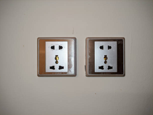 wall plug with many standard input options - drywall screw audio imagens e fotografias de stock