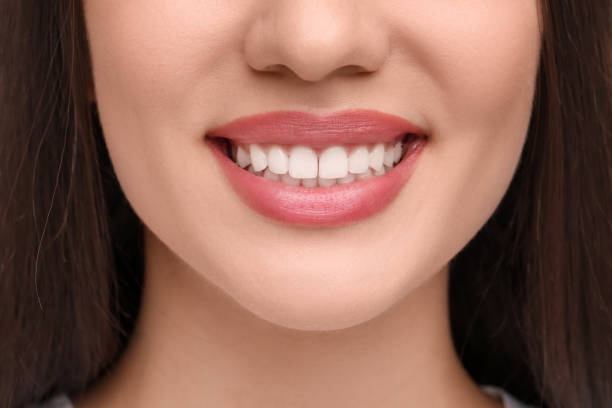 istock Smiling woman with clean teeth, closeup view 1878217556