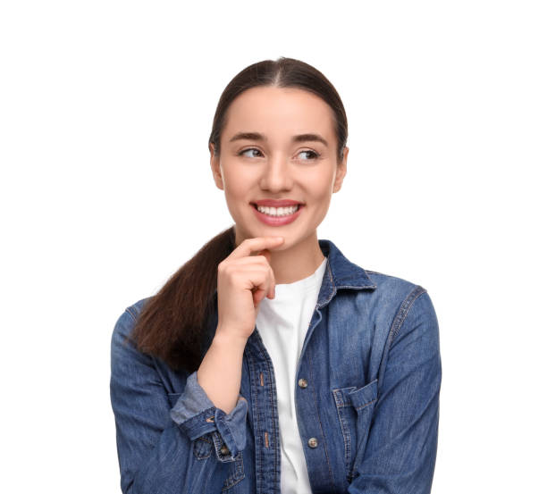 istock Young woman with clean teeth smiling on white background 1878218575