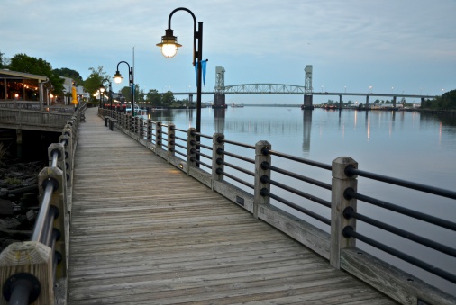 An early evening scene from the riverwalk along the Cape Fear river in downtown Wilmington, North Carolina.