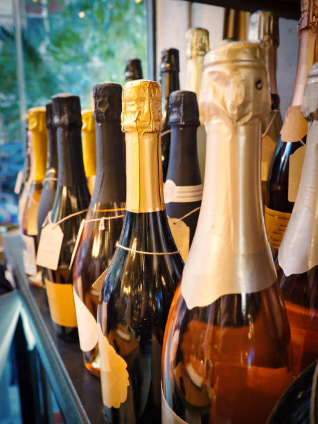 istock Champagne bottles close-up in a row 1878256138