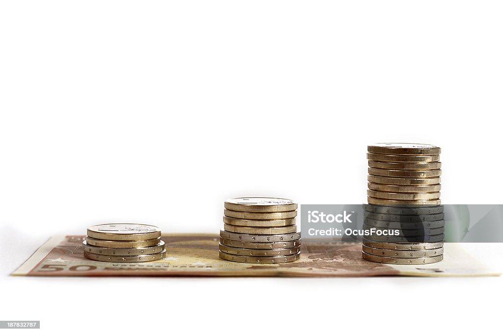 euro coins and banknotes pile isolated euro coins and banknotes pile isolated on white background Abundance Stock Photo