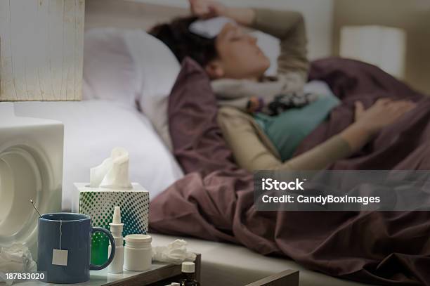Tissue Flu Medicines Ill Woman Bedside Table Stock Photo - Download Image Now - Pill, Sore Throat, Capsule - Medicine