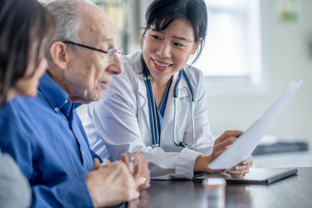 istock Senior Couple Medical Appointment 1878346934