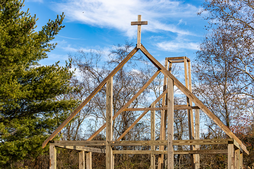 Leonardtown, Maryland USA Nov 30, 2023 The Newtowne Chapel, a  symbolic wooden chapel reconstruction in wood on the St. Francis Xavier cemetery, represents the oldest Catholic church in the 13 colonies originally built in this location in 1731