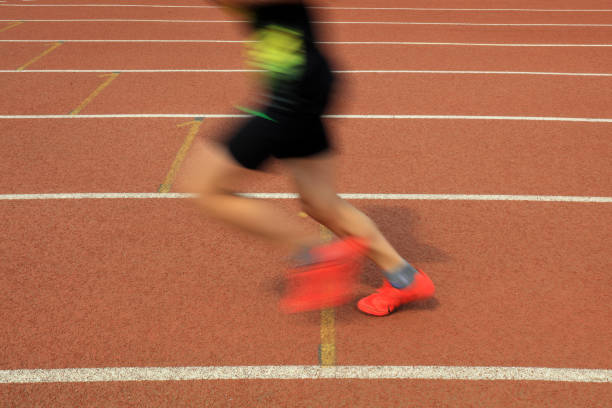istock Long distance runners are running on the track 1878347116