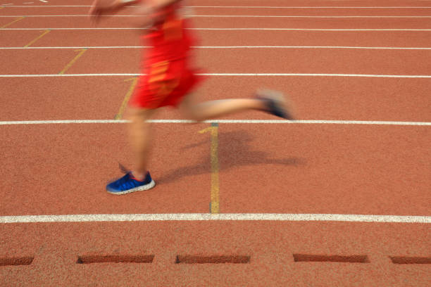 istock Long distance runners are running on the track 1878347193