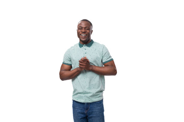 istock young handsome smiling african man dressed casually on studio background 1878351659