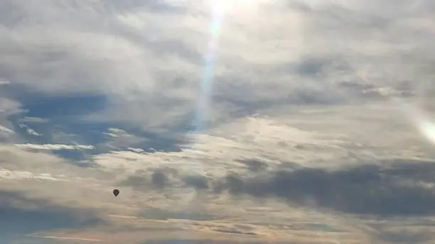 Bright sun shine on a Christmas weekend with wonderful clouds and even a lone hot air balloon.