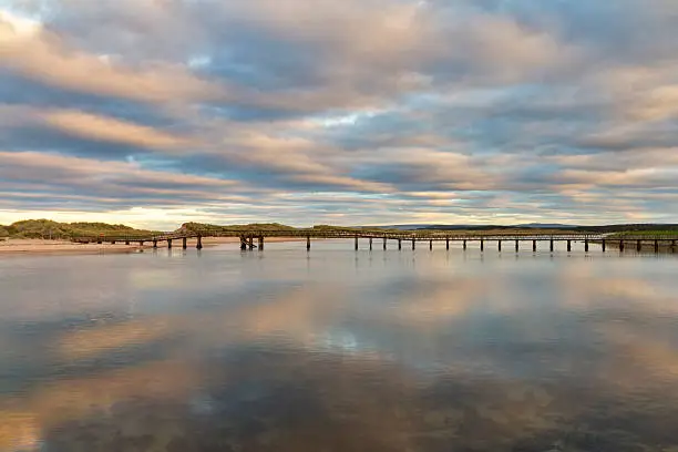 This is the footbridge across the river Lossie, at high tide, Lossiemouth, Moray, Scotland, United Kingdom.