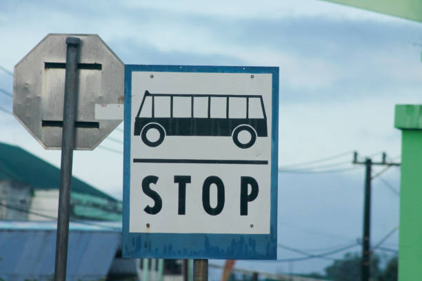 istock Bus Stop Sign on post pole, traffic road roadsign 1878464966