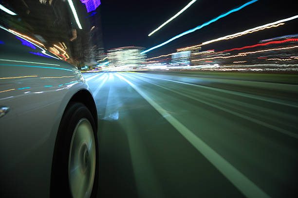 istock Driving in the night city 187850252