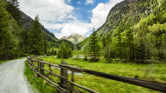 Mountain road in the Austrian Alps during spring