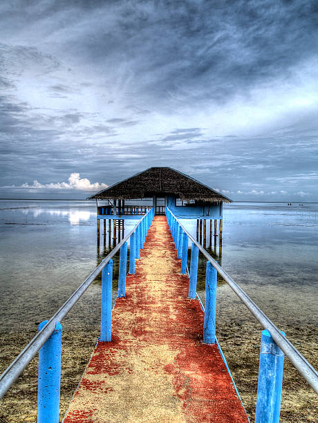 istock Old Pier and Still Ocean Water in the Philippines 187855858
