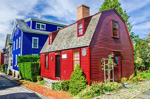 Photo of A view of a bright red New England house