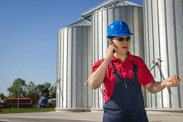istock Worker in the silo company 187857571