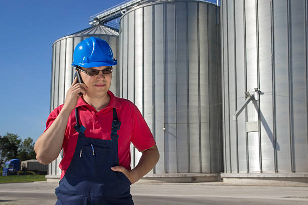 istock Worker in the silo company 187857667
