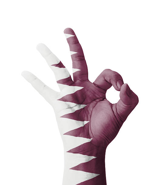 istock Hand making Ok sign, Qatar flag painted 187858304
