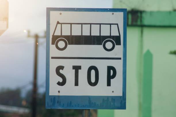 istock Bus Stop Sign on post pole, traffic road roadsign 1878595928
