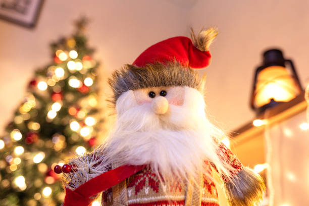 istock Charming Plush Santa Claus with Twinkling Christmas Lights 1878597981