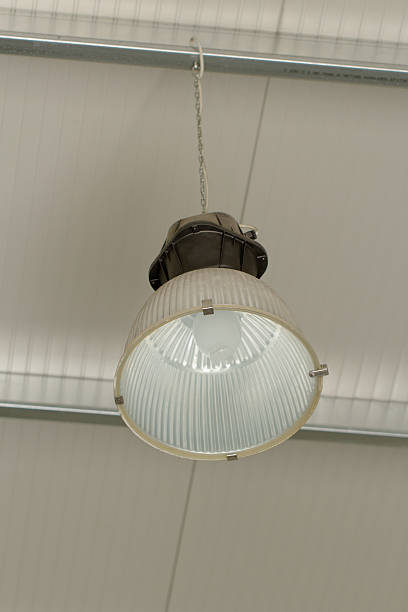 istock Industrial ceiling lamp hanging from the roof 187860300
