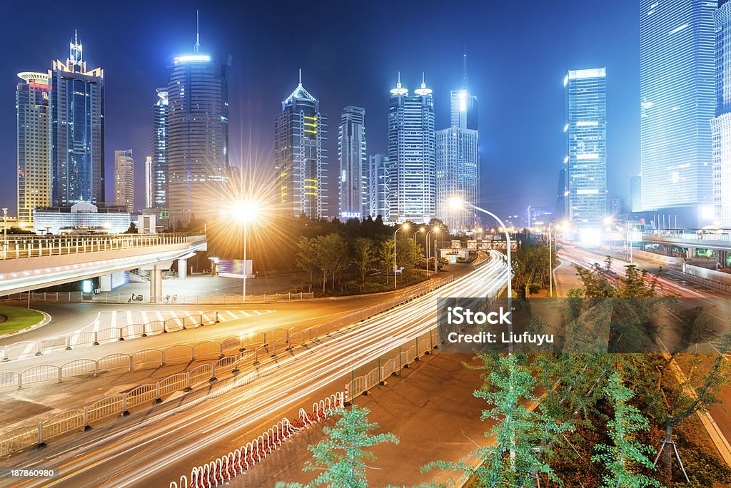 shanghai china the light trails on the modern building background in shanghai china Activity Stock Photo