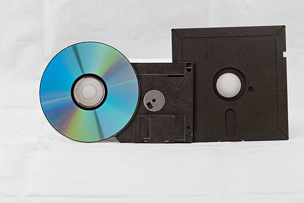 de moda disquete um cd, dvd - dvd obsolete cd cd rom imagens e fotografias de stock