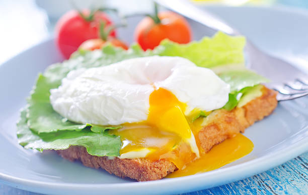 egg-poached sandwich with egg granary toast stock pictures, royalty-free photos & images