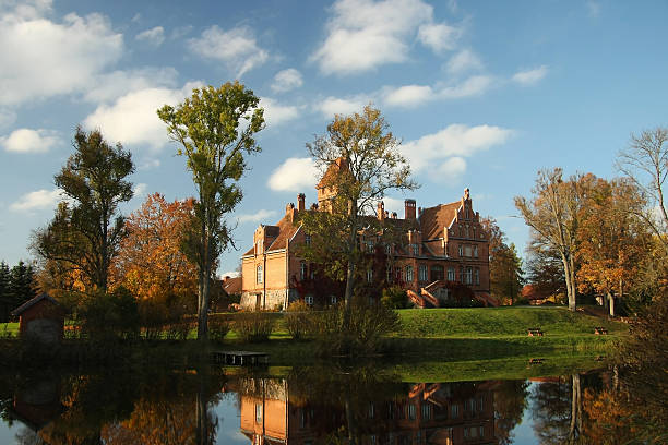 istock little castle near lake 187861608