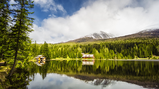 Lake with cabin in the Austrian Alps