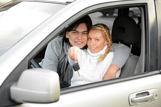 istock Young couple in car 187863692