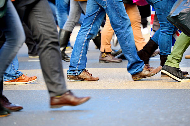istock Young people crossing street, motion blur 187865711