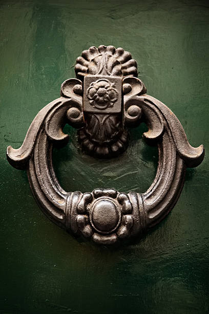 istock Old knocker on a door, Rome, Italy 187870122
