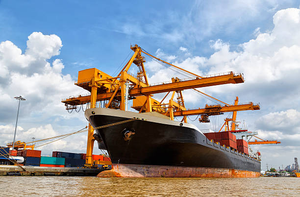 istock Cargo ship at the port with blue sky 187870150