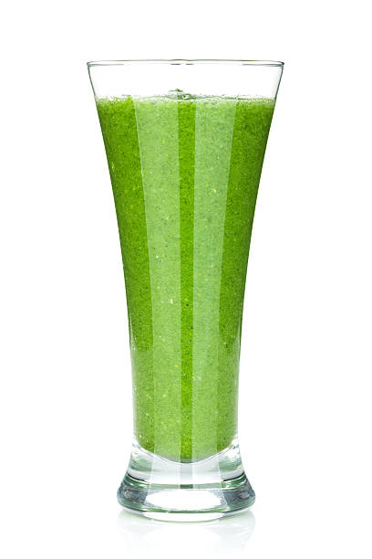 istock Green vegetable smoothie in a tall glass 187870657