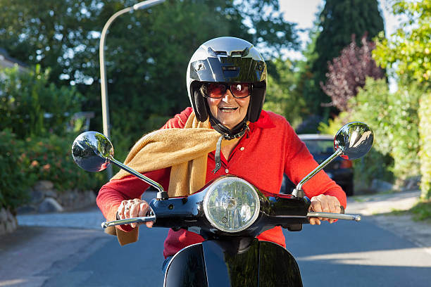 istock Senior lady riding her scooter. 187870677