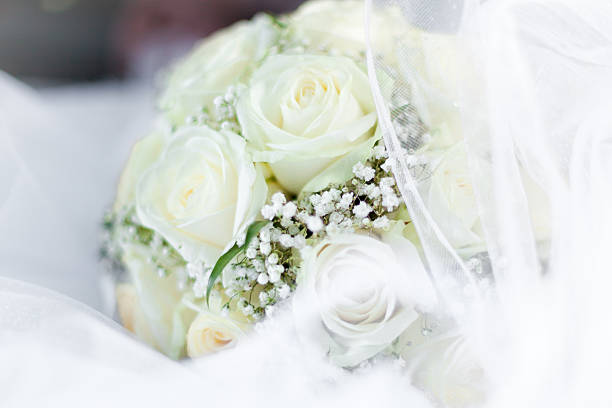 Beautiful wedding flower bouquet and wedding rings
