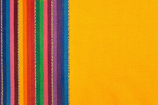 Bunch of colorful cotton napkins stacked on top of each other.
