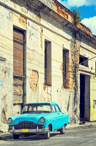 An old American car in Havana, Cuba.  Vintage filter applied.