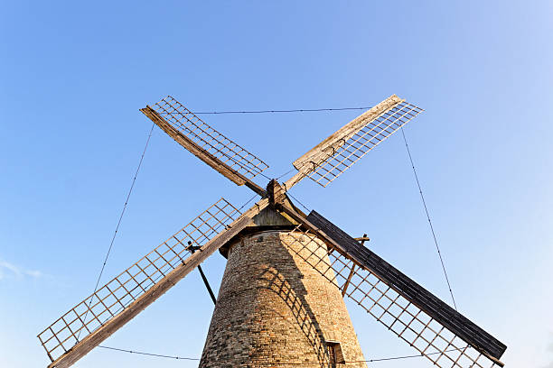 istock Old wooden mill against the blue sky 187875341