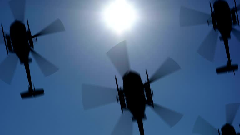 Helicopter silhouette in the sky. Seamless loop, HD