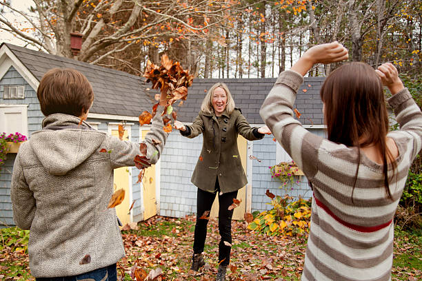 istock Family Playing on an Autumn Day 187875908
