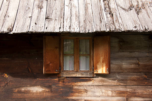 istock Window - wooden house 187876104