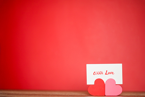 Love sign and hearts. For Valentine’s Day, love, engagement storytelling, greeting cards.